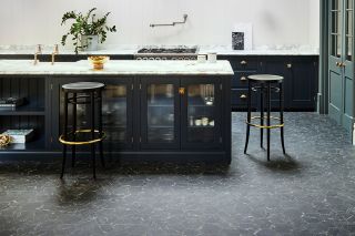 chic black modern kitchen with black vinyl flooring